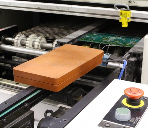 Reflow soldering or adhesive curing